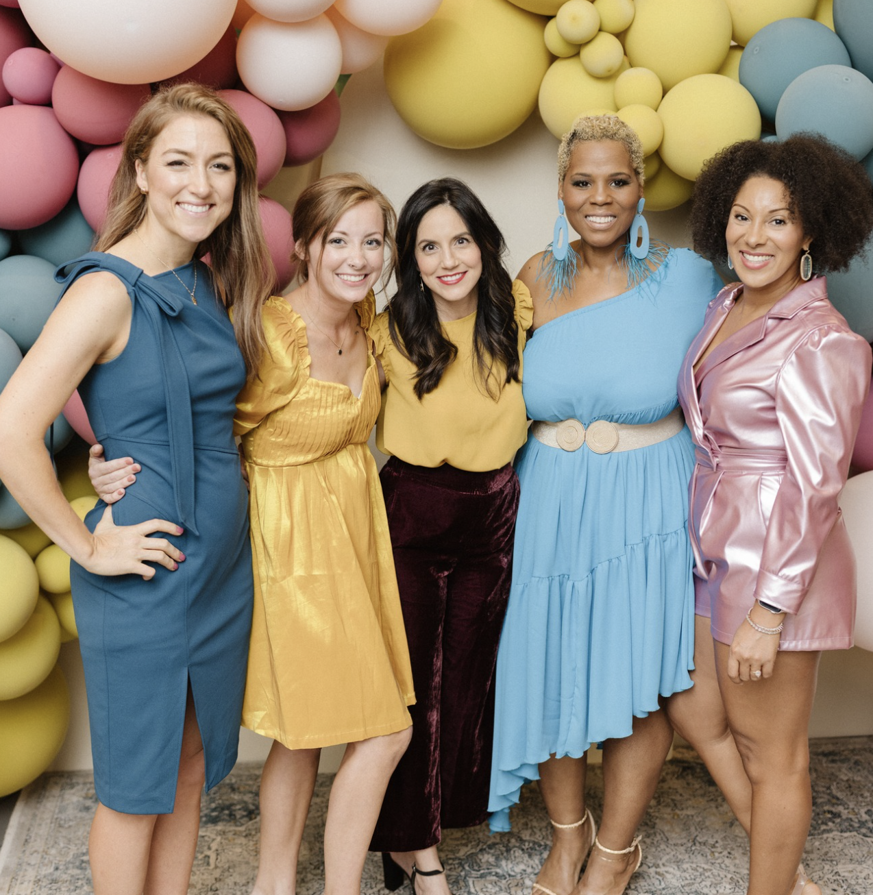 Group of moms at The Gulf Coast Mom rebrand launch event