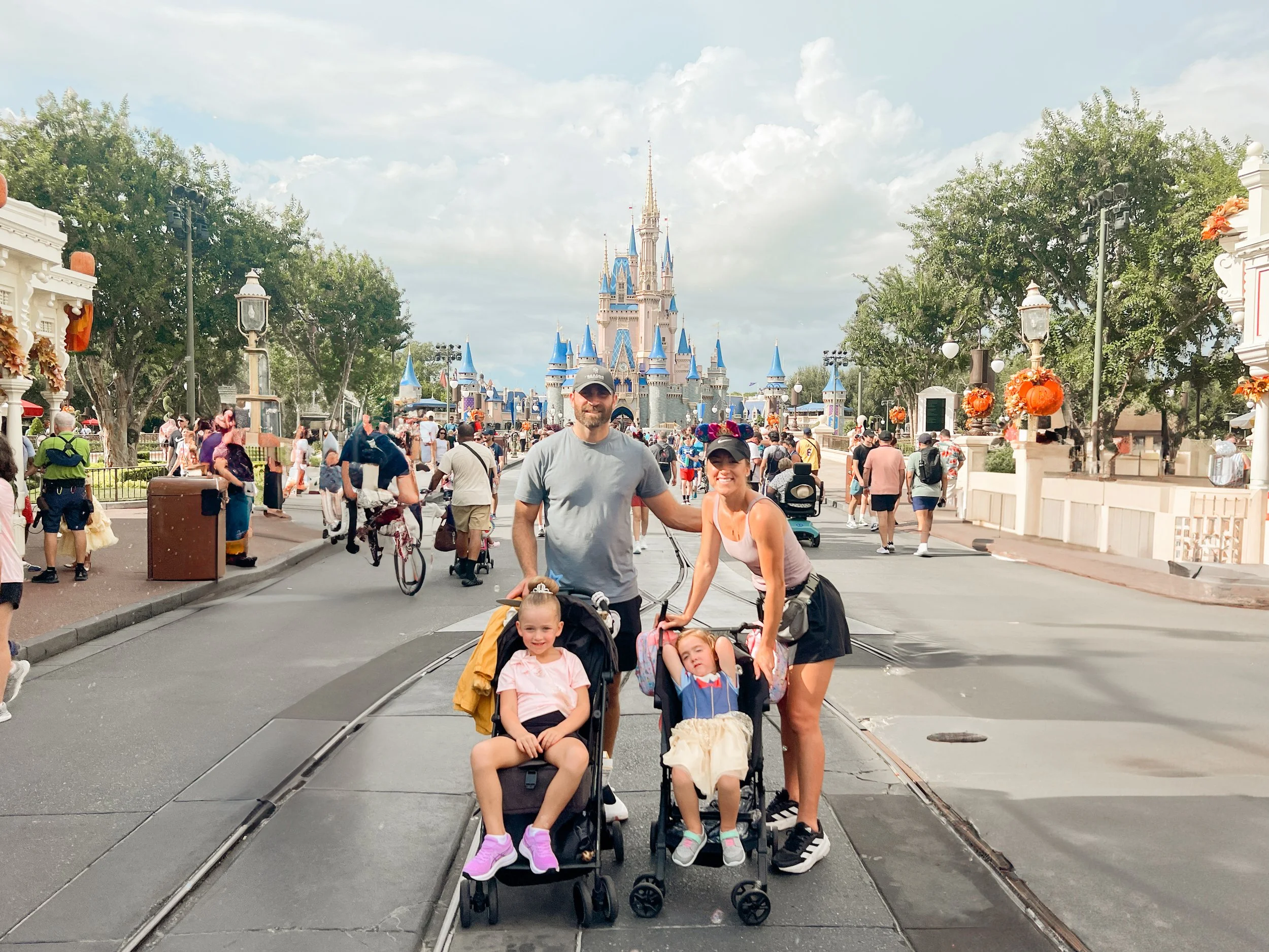 Family walking down Main Street at Magic Kingdom in Orlando