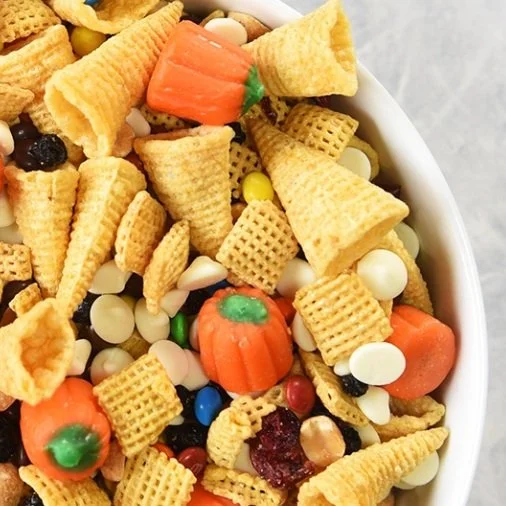 Thanksgiving party mix with Bugles, Chex and candy pumpkins