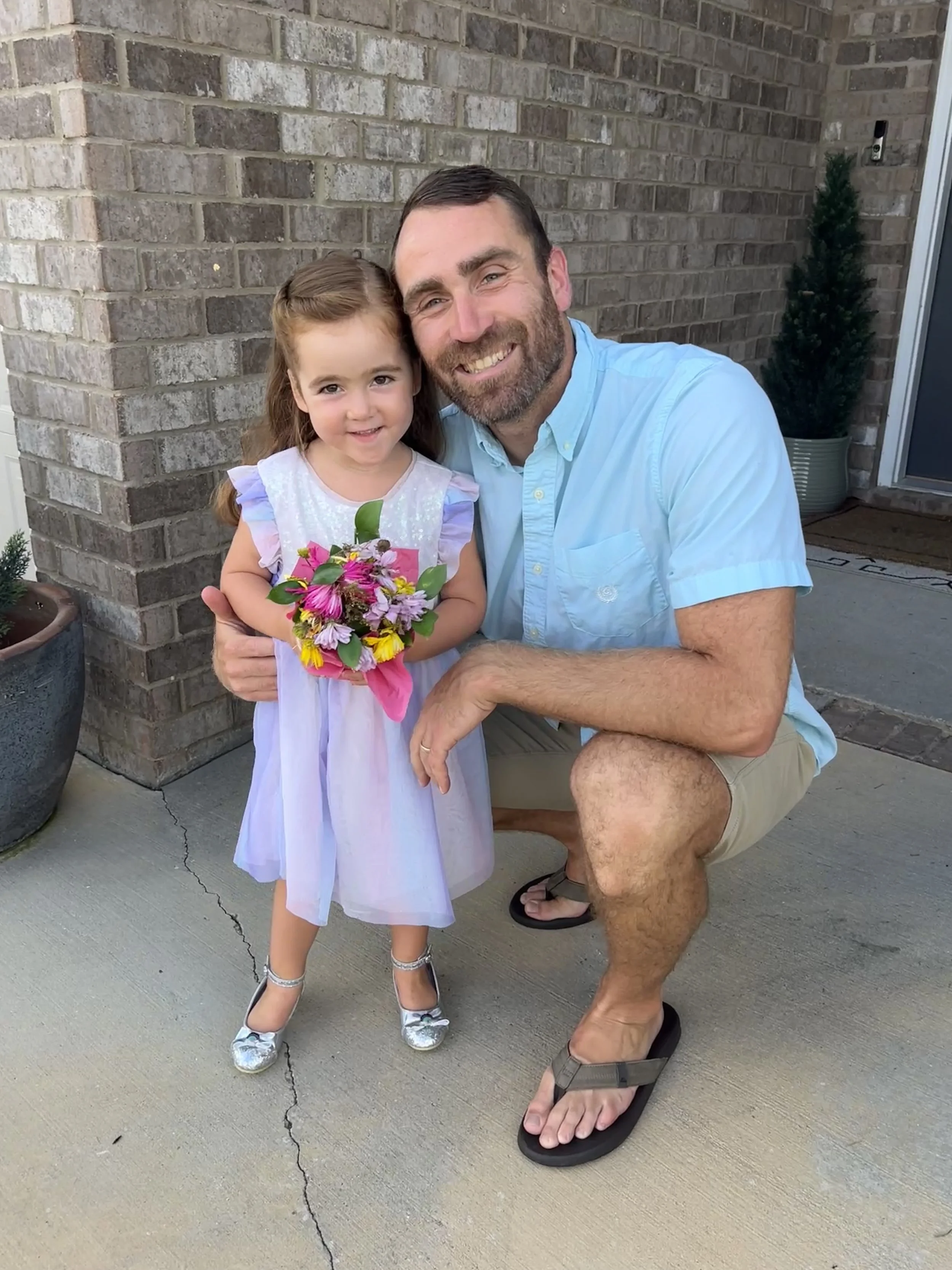 Dad and daughter dressed up for a daddy-daughter date