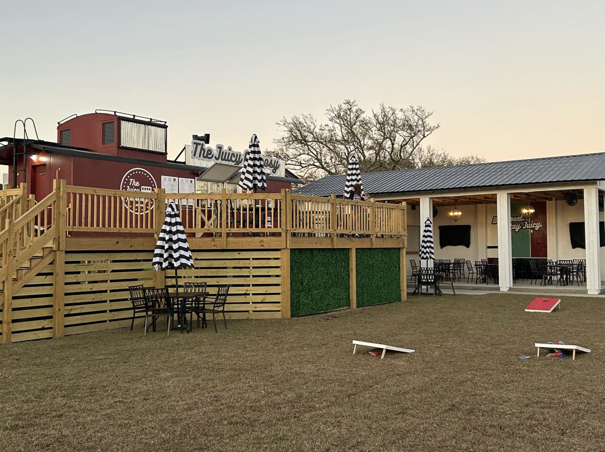 Outdoor yard and patio at The Juicy Caboosy