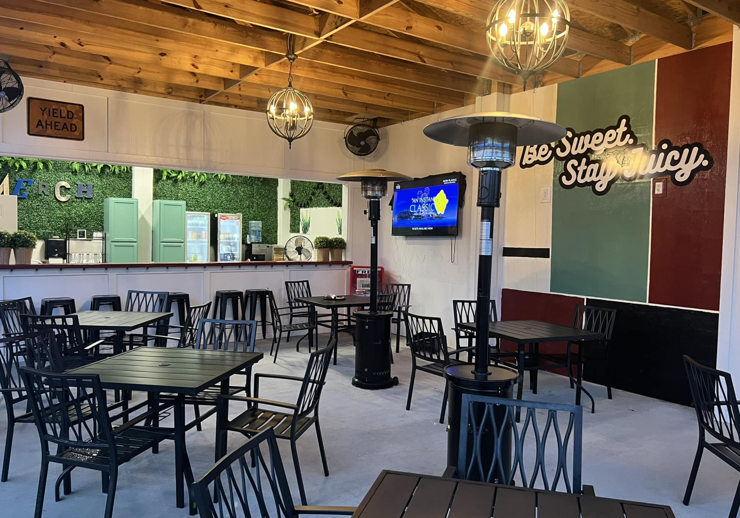 Indoor seating area at The Juicy Caboosy