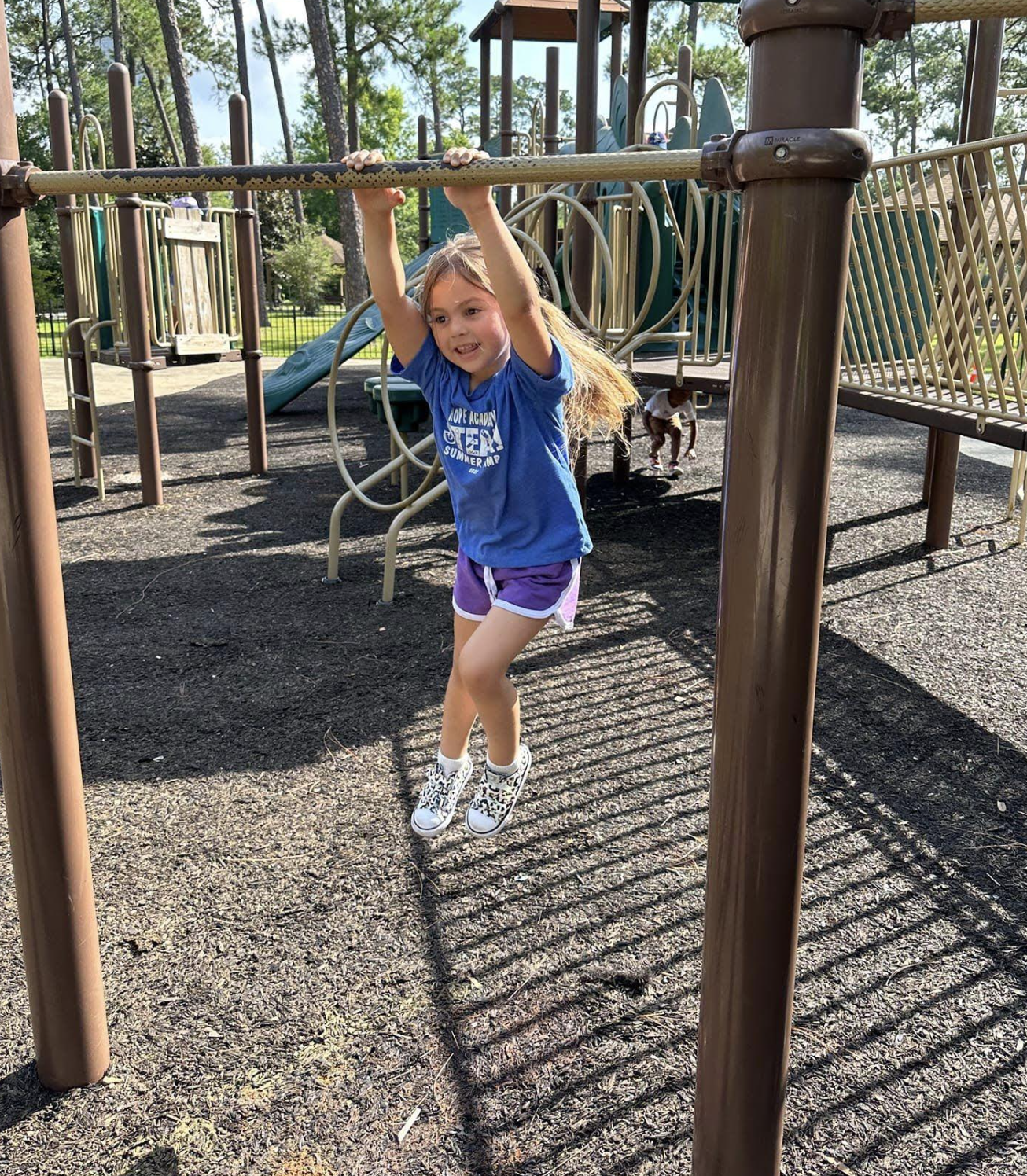 Child playing on the playground at Hope Academy