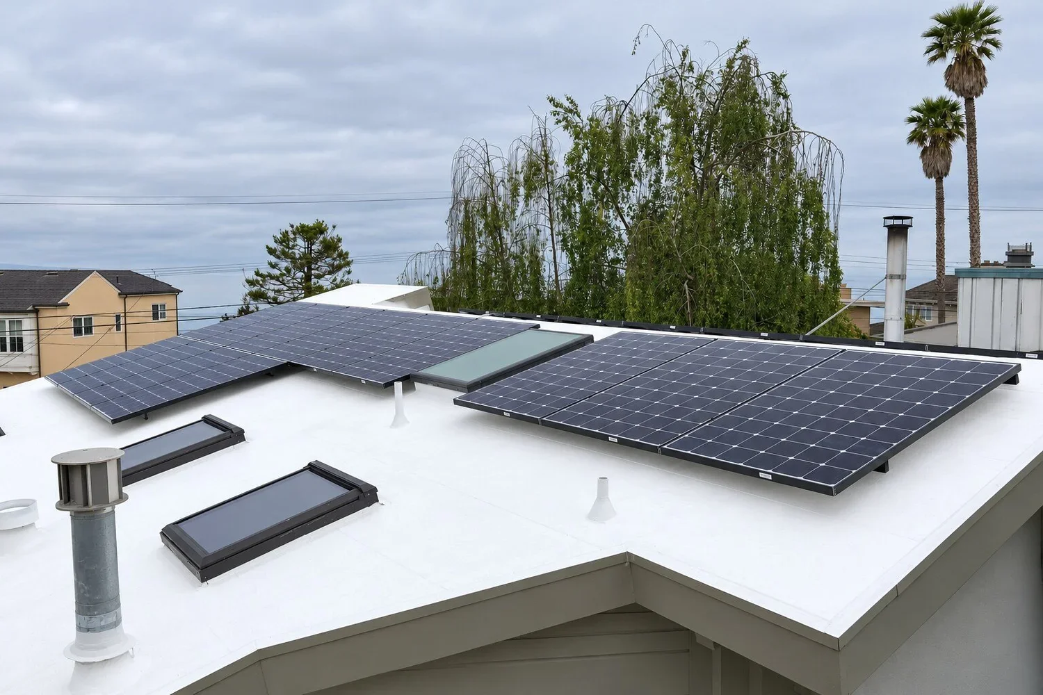 Flat roof solar installation around skylights, Santa Cruz County