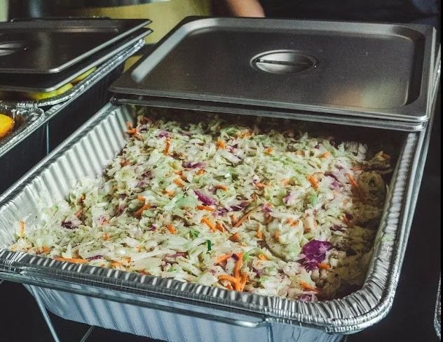 a  picture of coleslaw in a tray