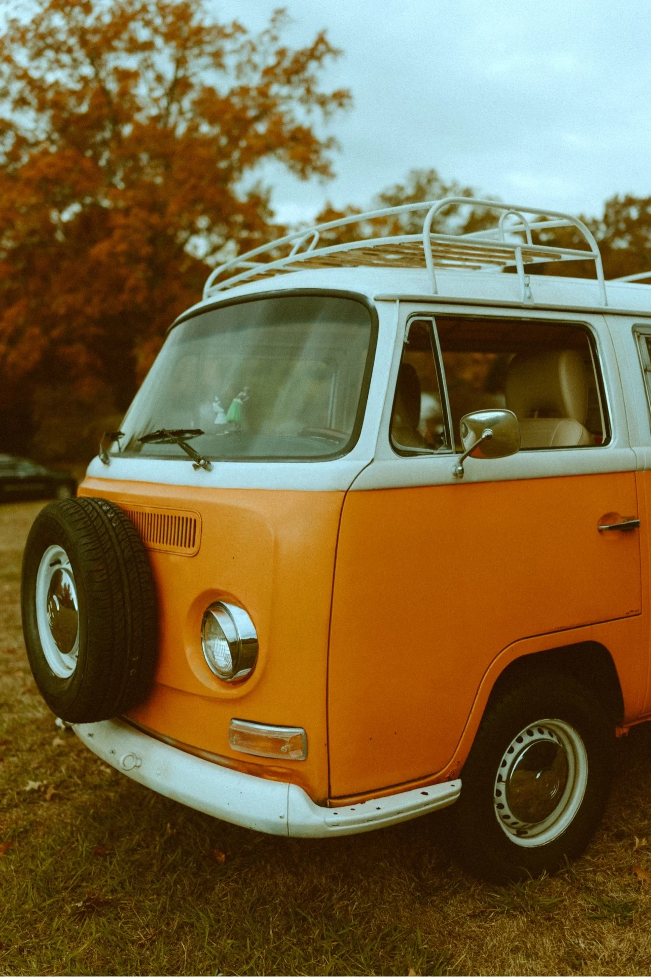 Nancy, orange 1970 VW bus front view with spare tire, Knoxville TN