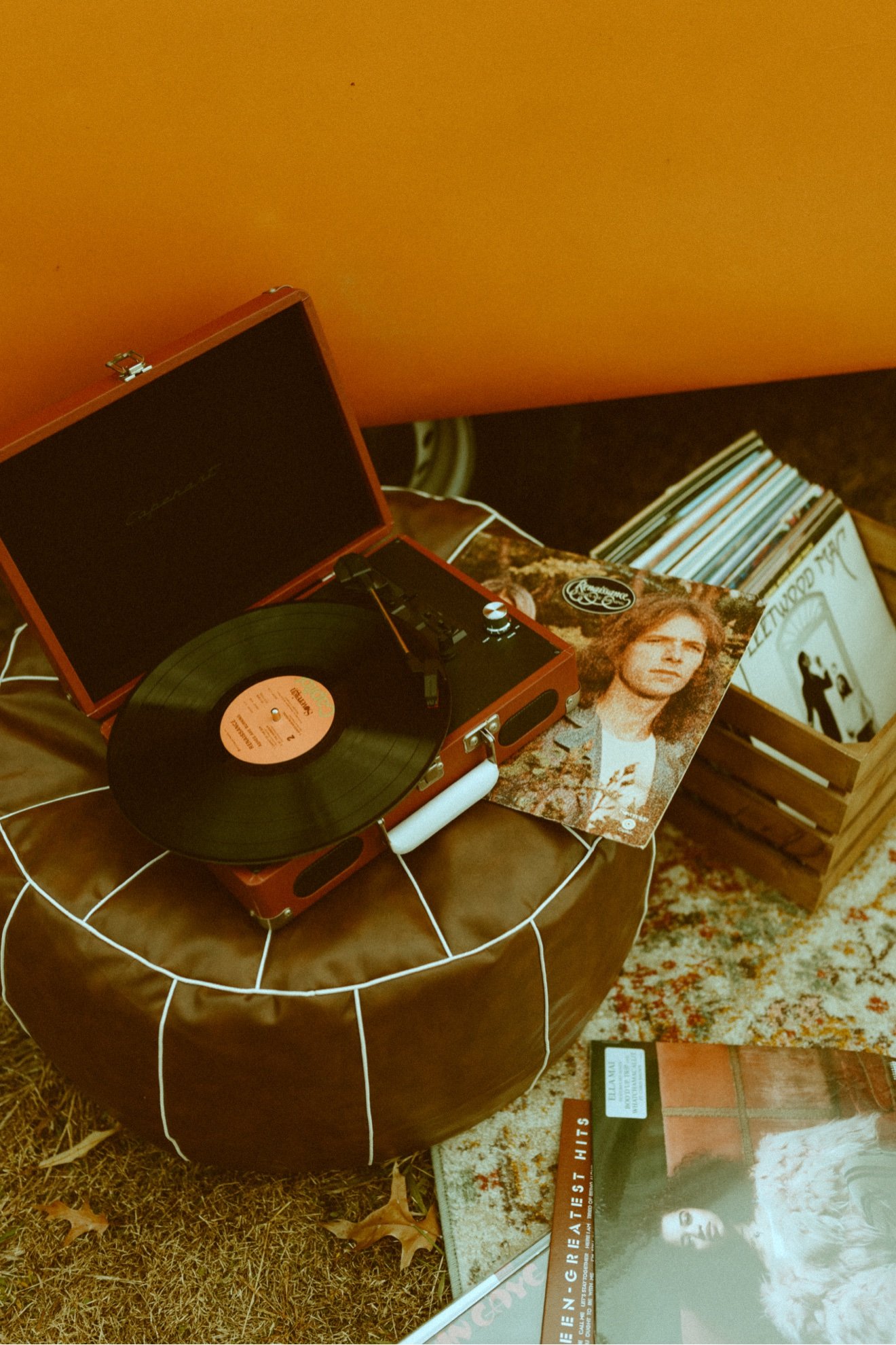 Record player and vinyl setup at a brand content shoot with Nancy, orange VW bus, Knoxville TN