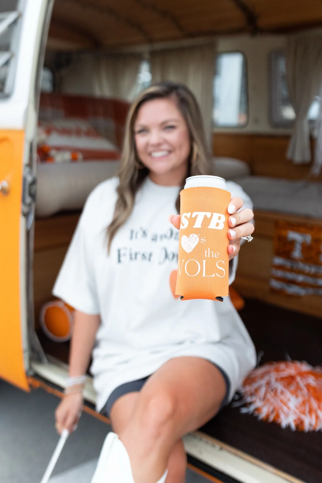 Brand content shoot with Nancy, orange VW bus — game day koozie product photo, Knoxville TN