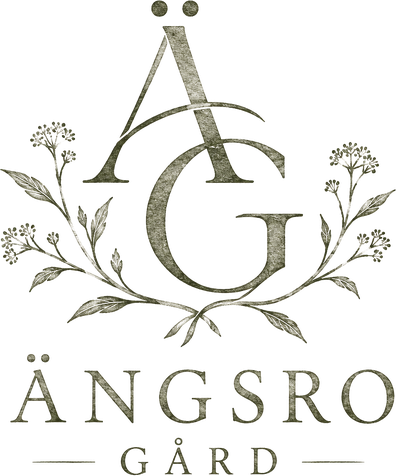 Logo élégant « Angsro Gard » avec monogramme AG doré, couronne florale et ornements botaniques.