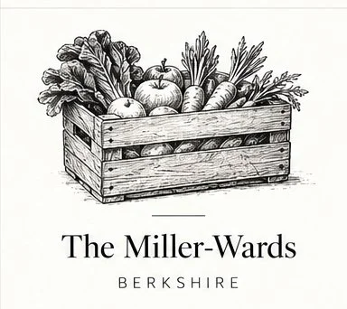 Black and white illustration of a wooden crate filled with apples, carrots, and leafy greens, with the text 'The Miller-Wards Berkshire' underneath.