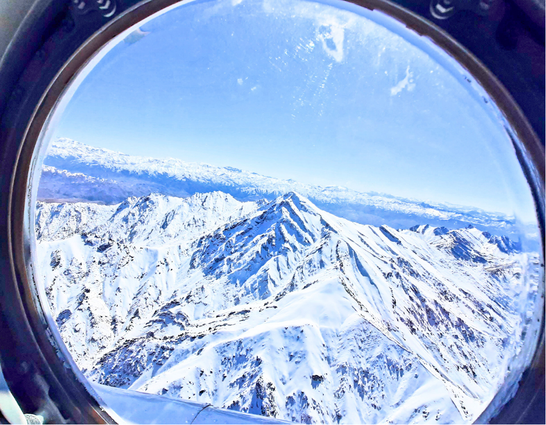 Snow blankets the mountain ranges of Afghanistan’s Central Highlands, tracing the ridgelines and filling the valleys with winter light. Viewed from above, the landscape reveals a striking pattern of white peaks and deep shadows, capturing the stillne