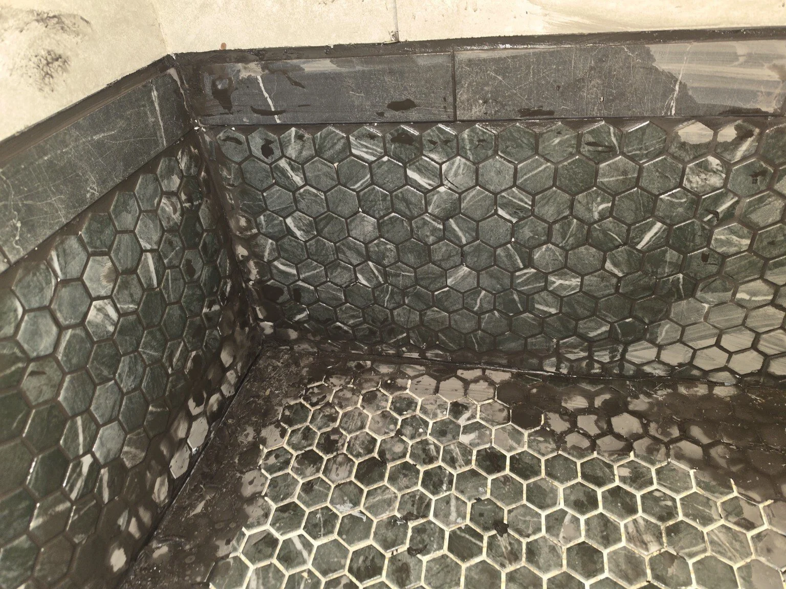 Shower tile installation in progress