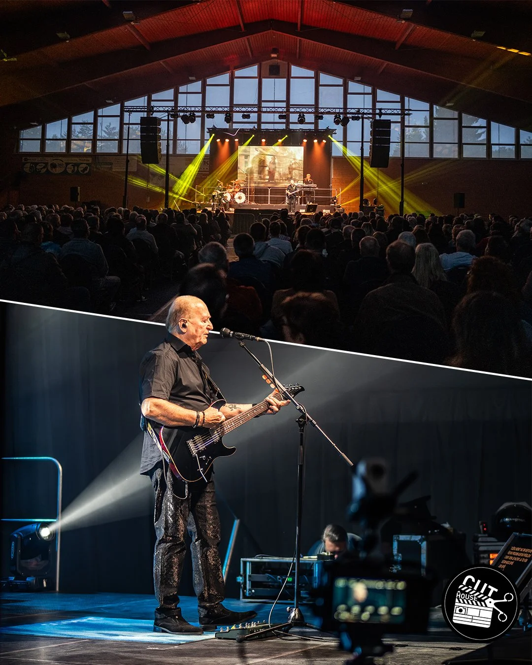 Live music concert with a band performing on stage in a large indoor venue. An elderly male guitarist is in the foreground, playing guitar and singing into a microphone. The audience watches the performance, and stage lighting creates a vibrant atmos