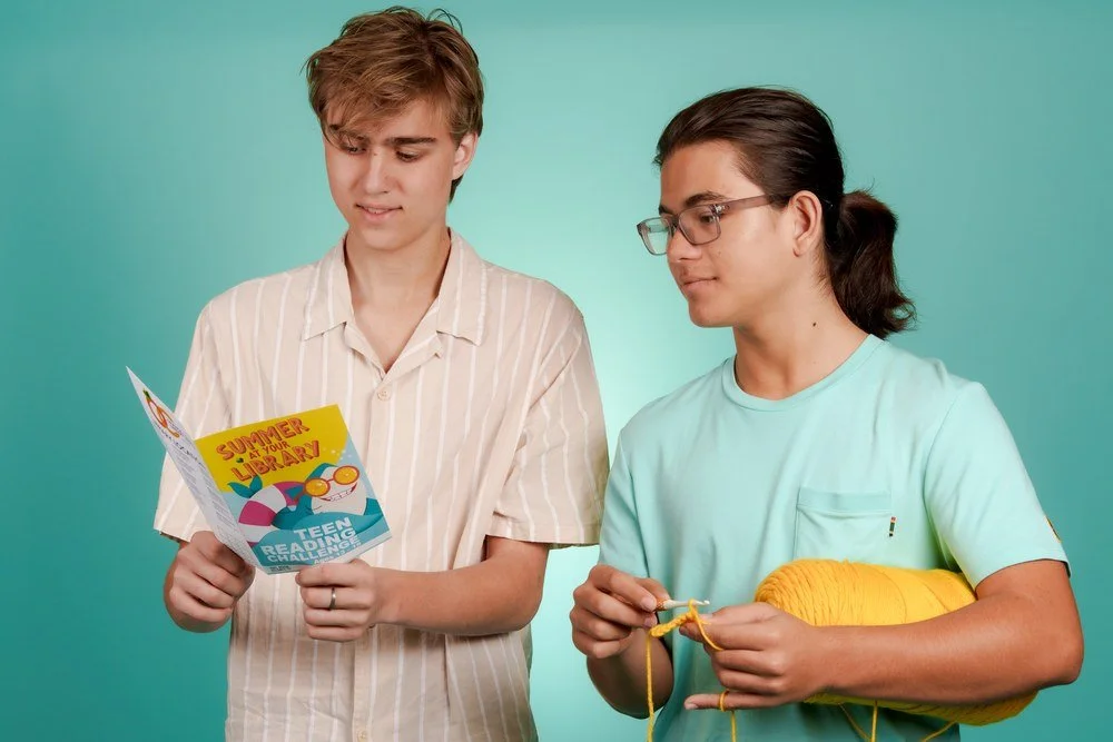 Teens reading for Summer at Your Library, Orange County Library System
