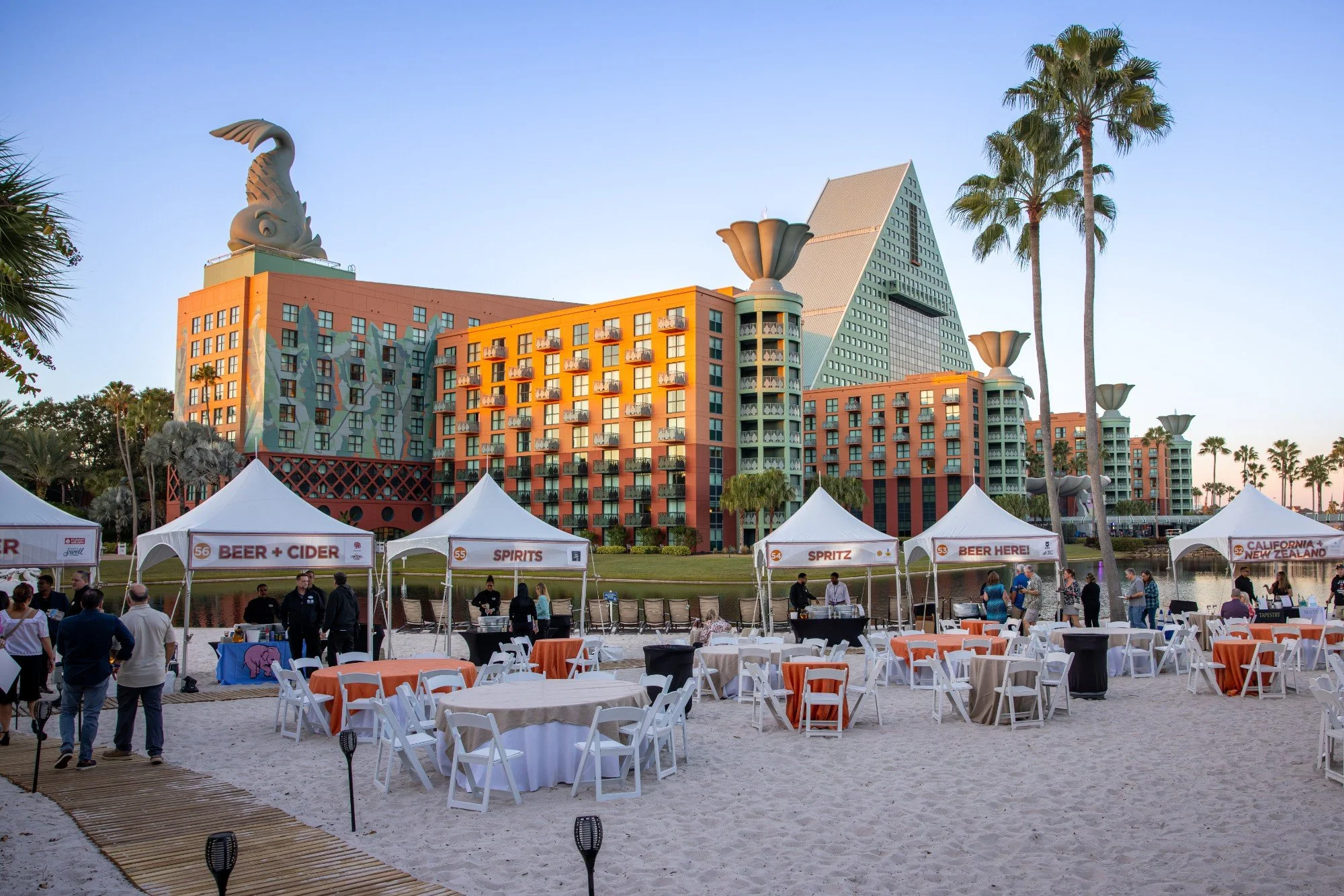 Tents and tables set along the Walt Disney World Swan and Dolphin causeway for the Food & Wine Classic
