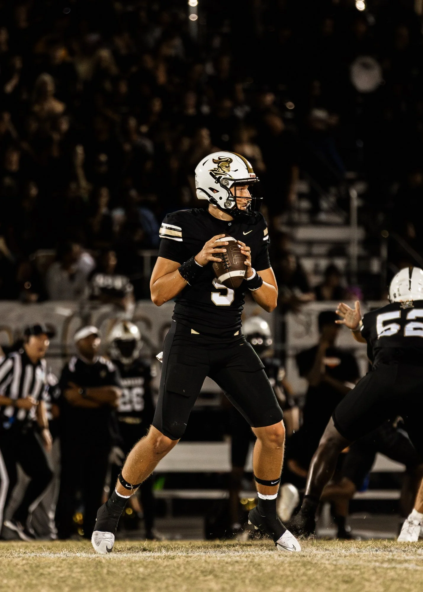 Jack McKissock playing high school football