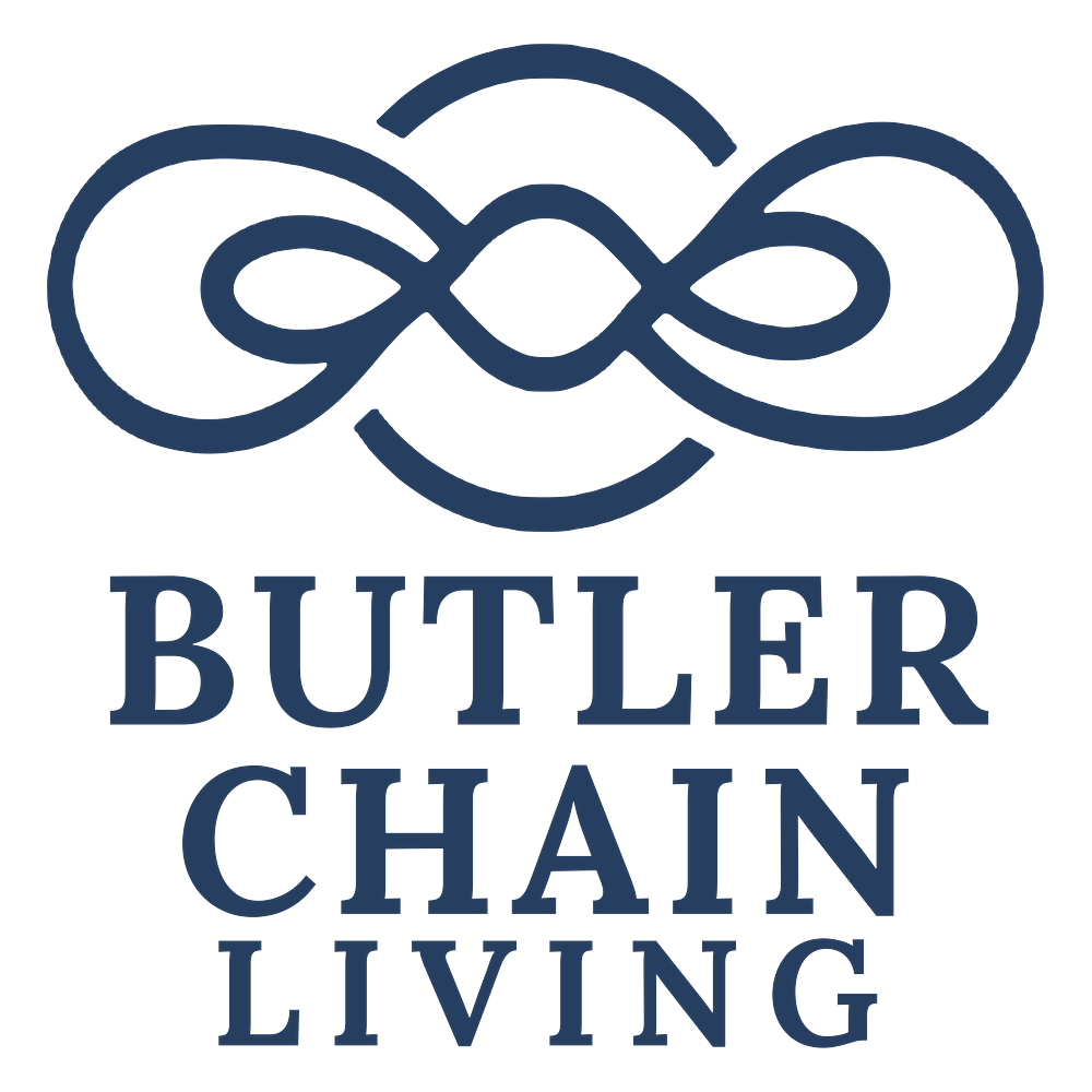 Butler Chain Living magazine logo, a knot shaped like the chain of lakes