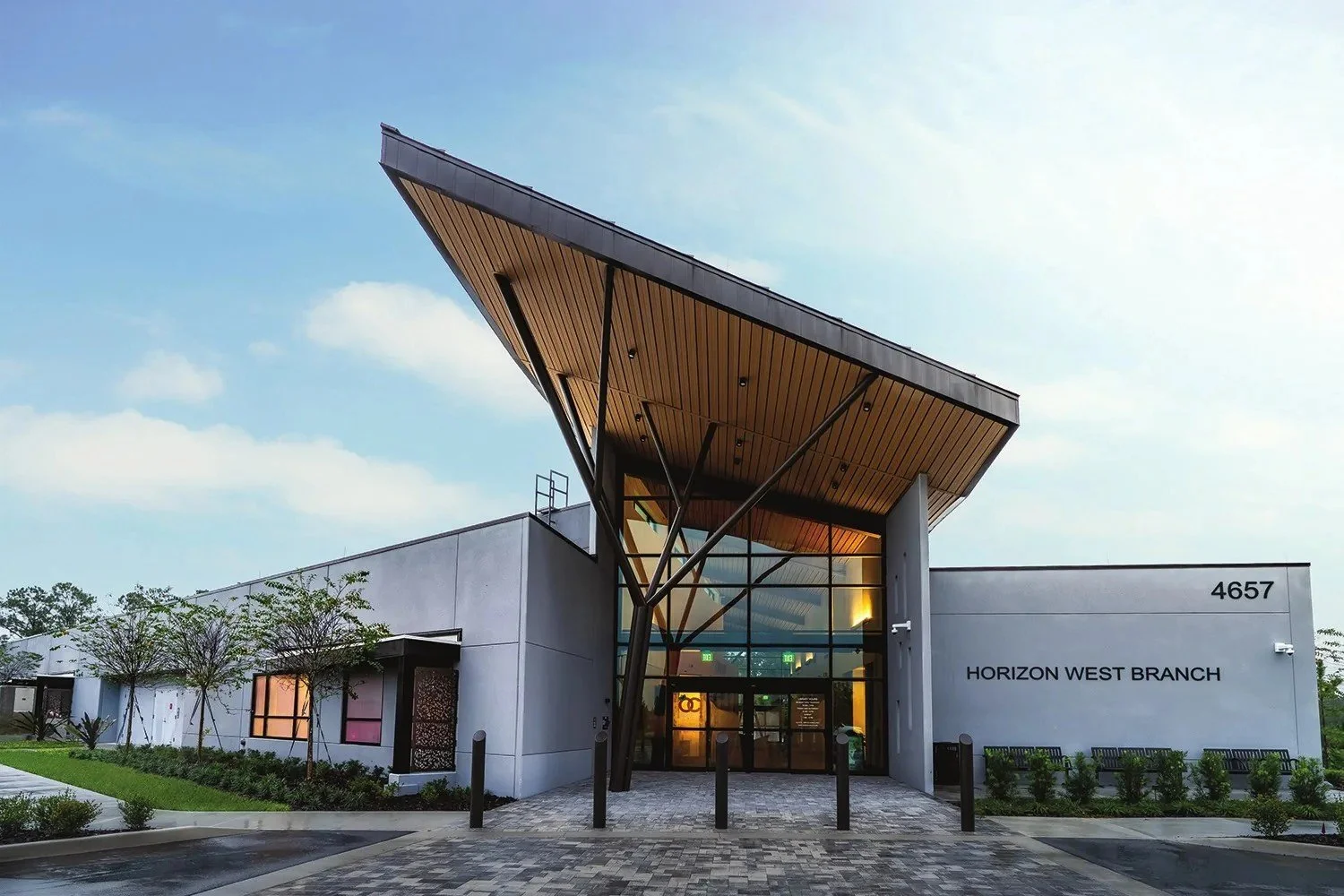 The modern Horizon West Branch library building with a sharply angled roof and glass entrance