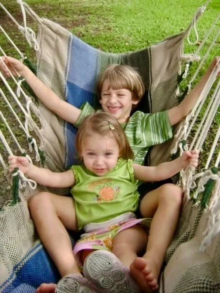 Young Jacob and Emily O'Brien in a hammock