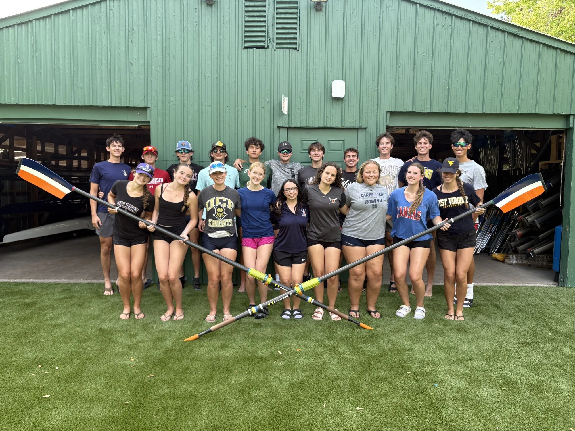 The OARS rowing team at the boathouse off Maguire Road