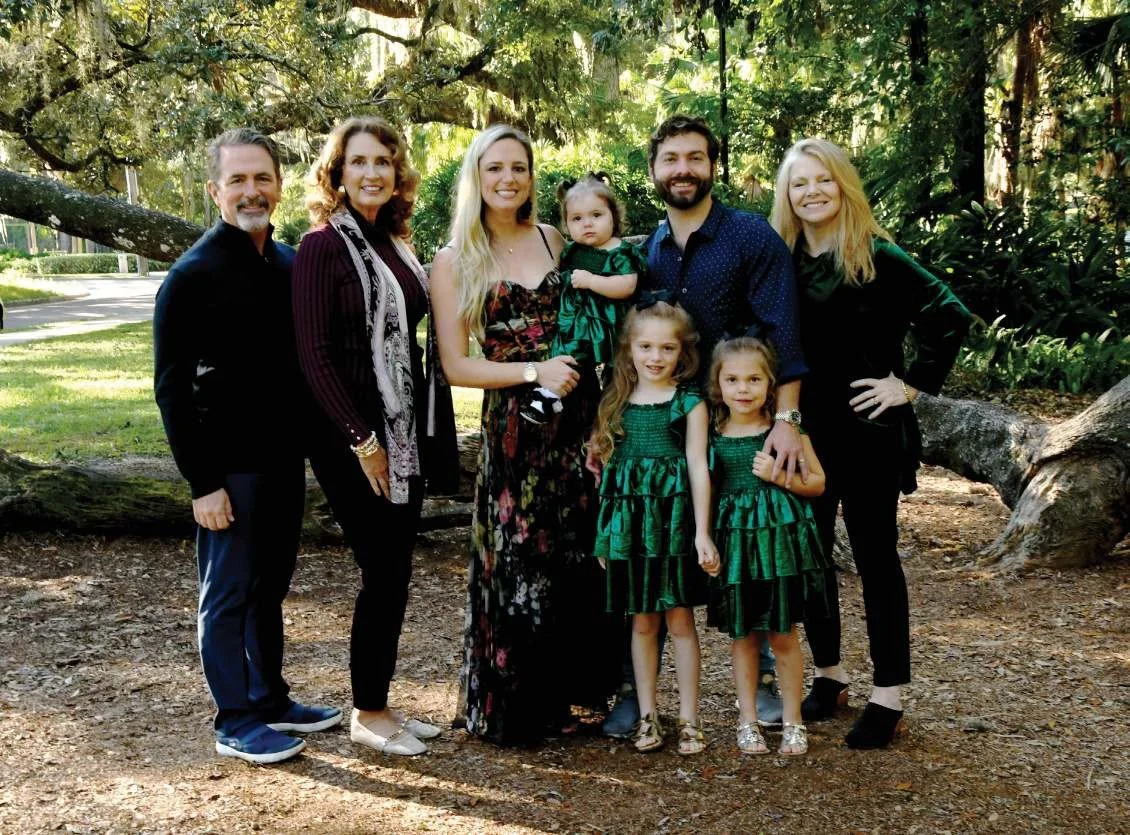 Jim and Tarra Curtis, Natalie, Amelia, Keegan, Lily and Abigail Berry, and Cheryl DeGroff-Gunter under the oaks