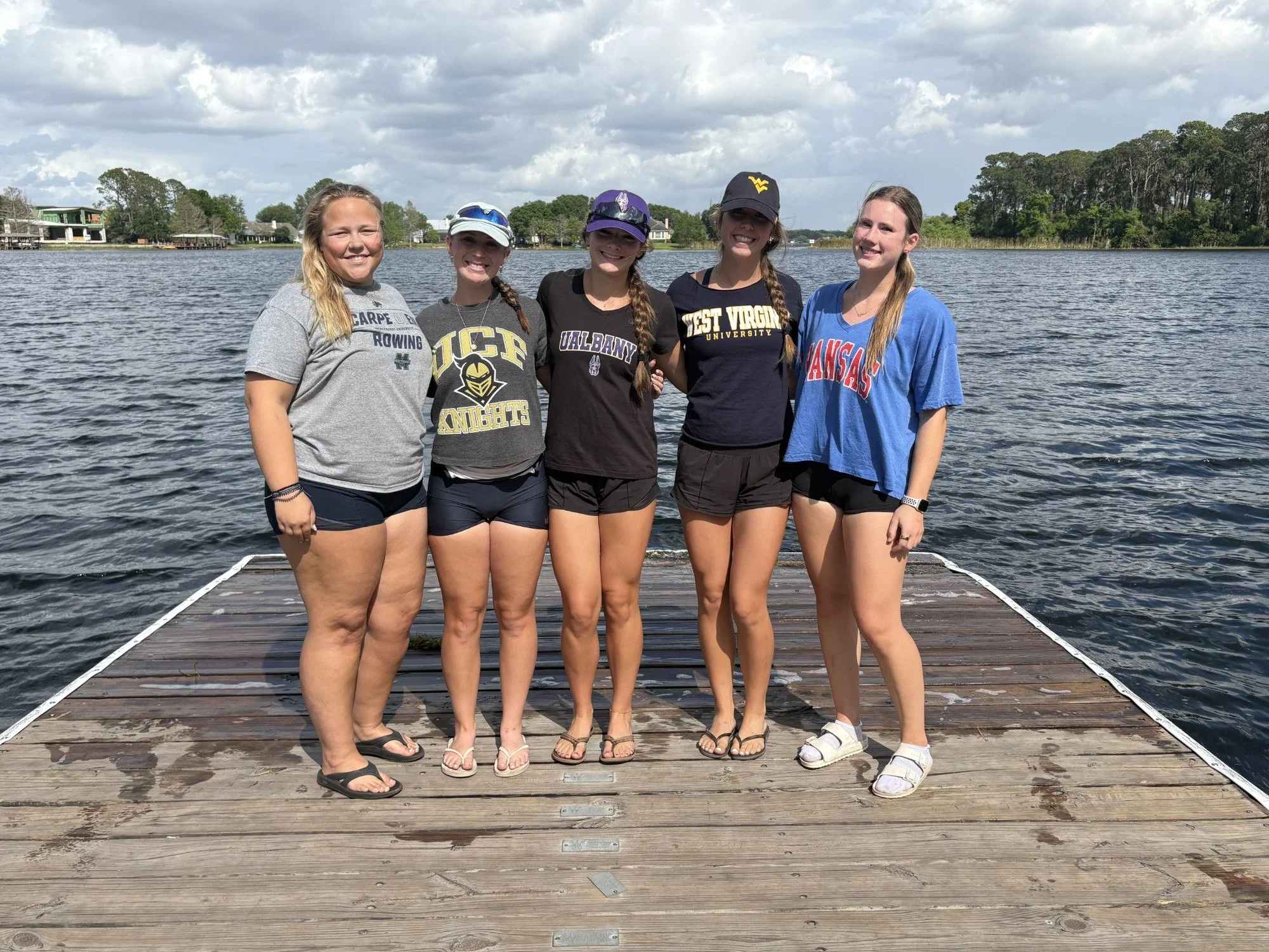 OARS senior rowers in their future college colors on the Butler Chain of Lakes