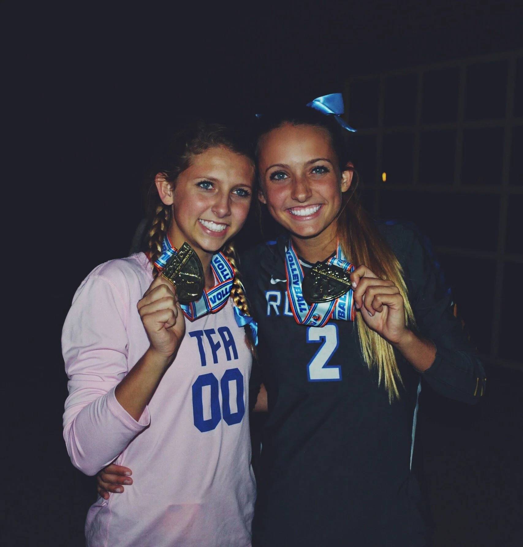 The McKissock sisters with their volleyball medals