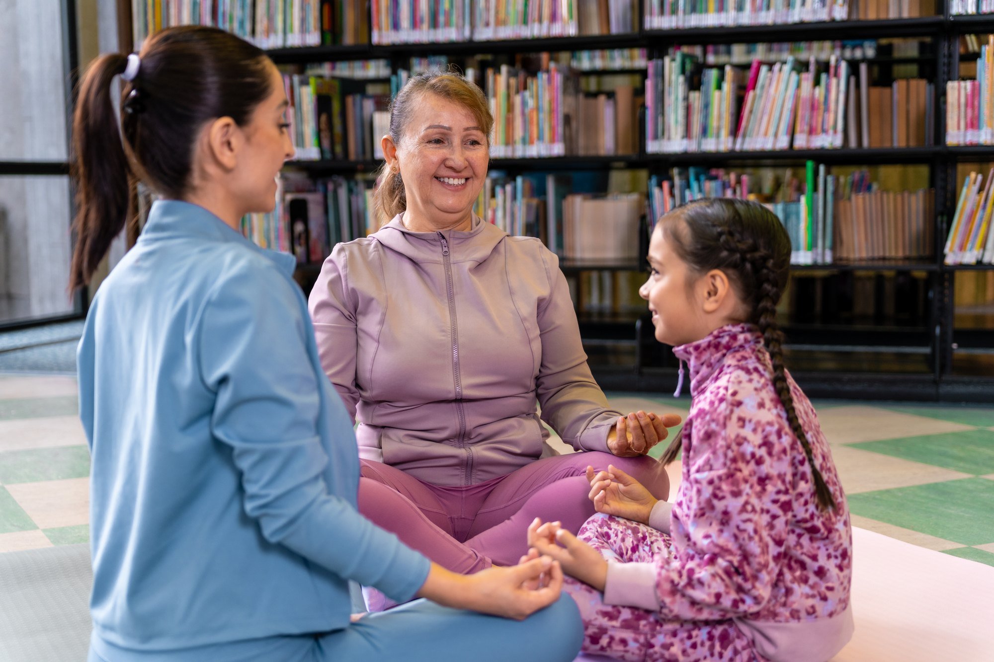 Family enjoying a yoga program at an Orange County Library System branch