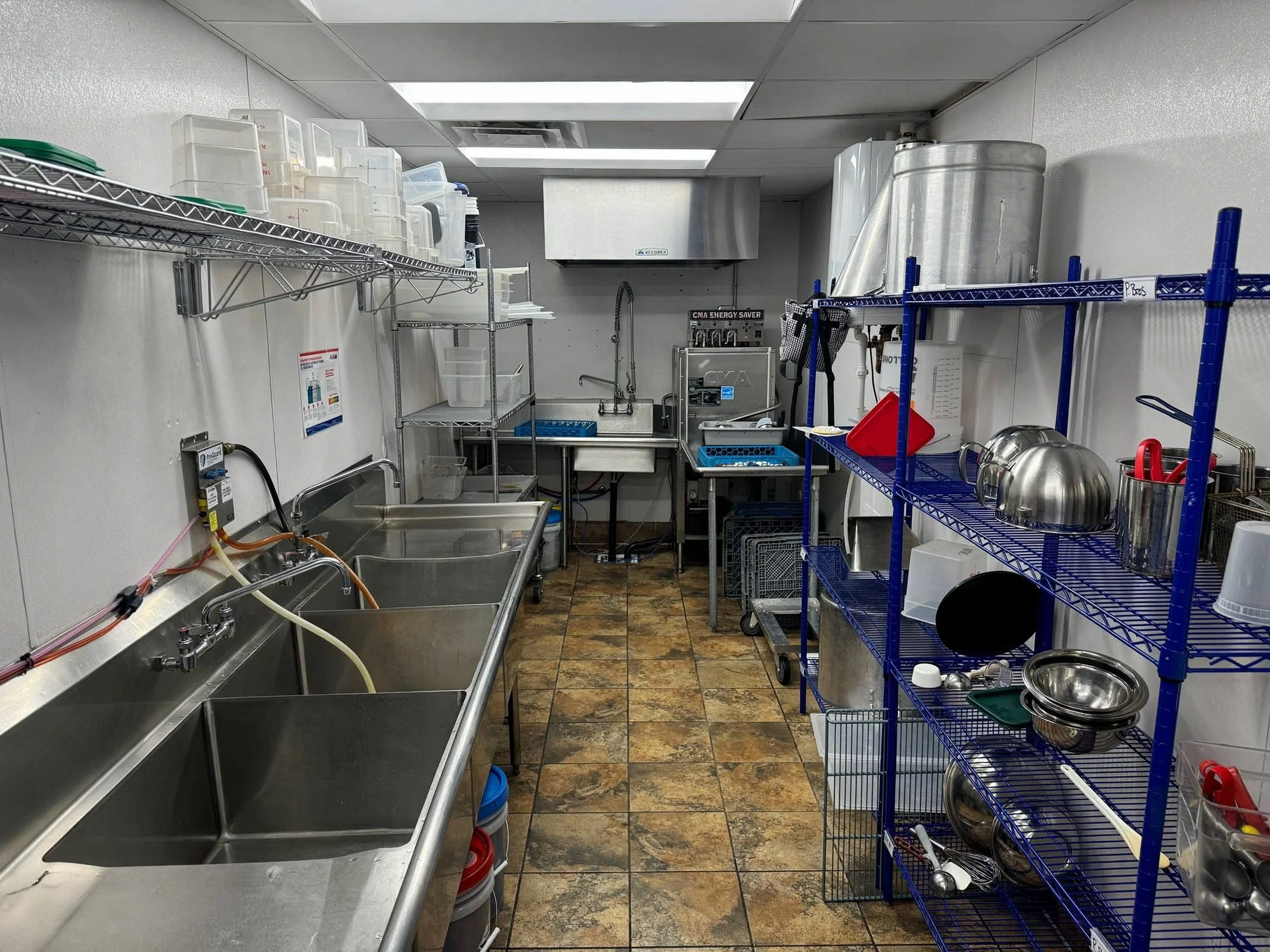 Dish area with 3-compartment sink at Provision Kitchen