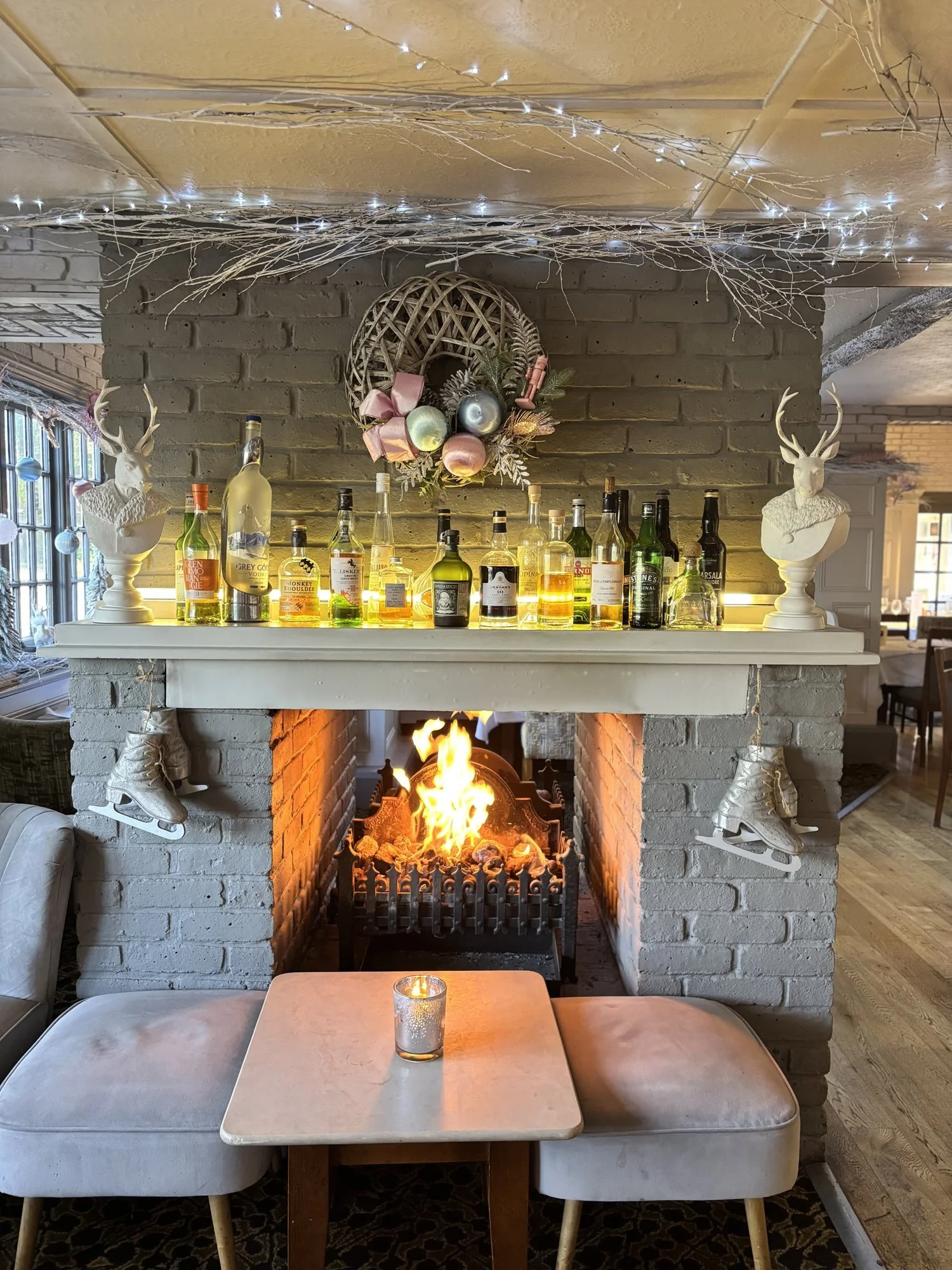 Bottles above the fireplace.jpg