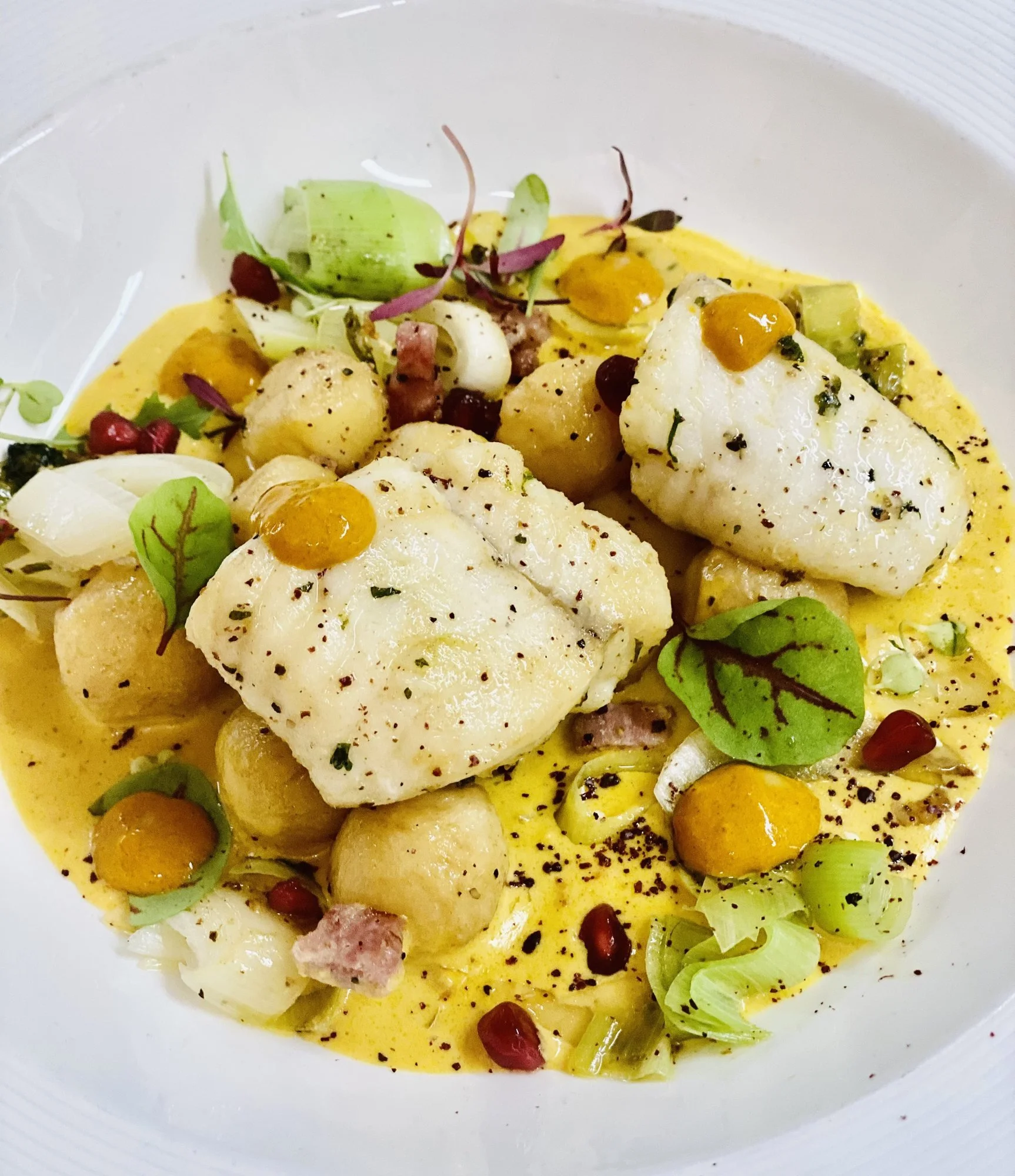 Fish with gnocchi and saffron sauce.jpg