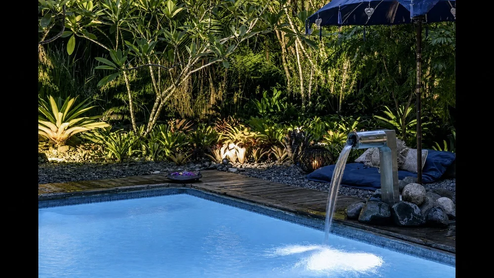 Casa Del Soul pool edged by tropical gardens