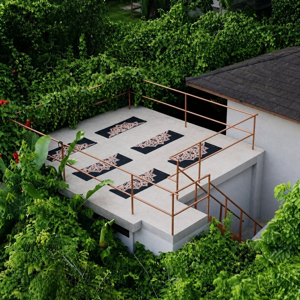 Open-air yoga deck at Casa Del Soul with mats laid out among the trees