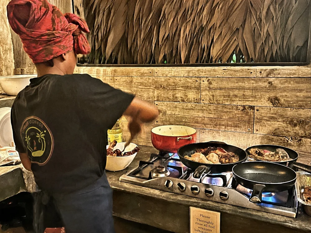 Chef cooking at the open-air kitchen at Casa Del Soul