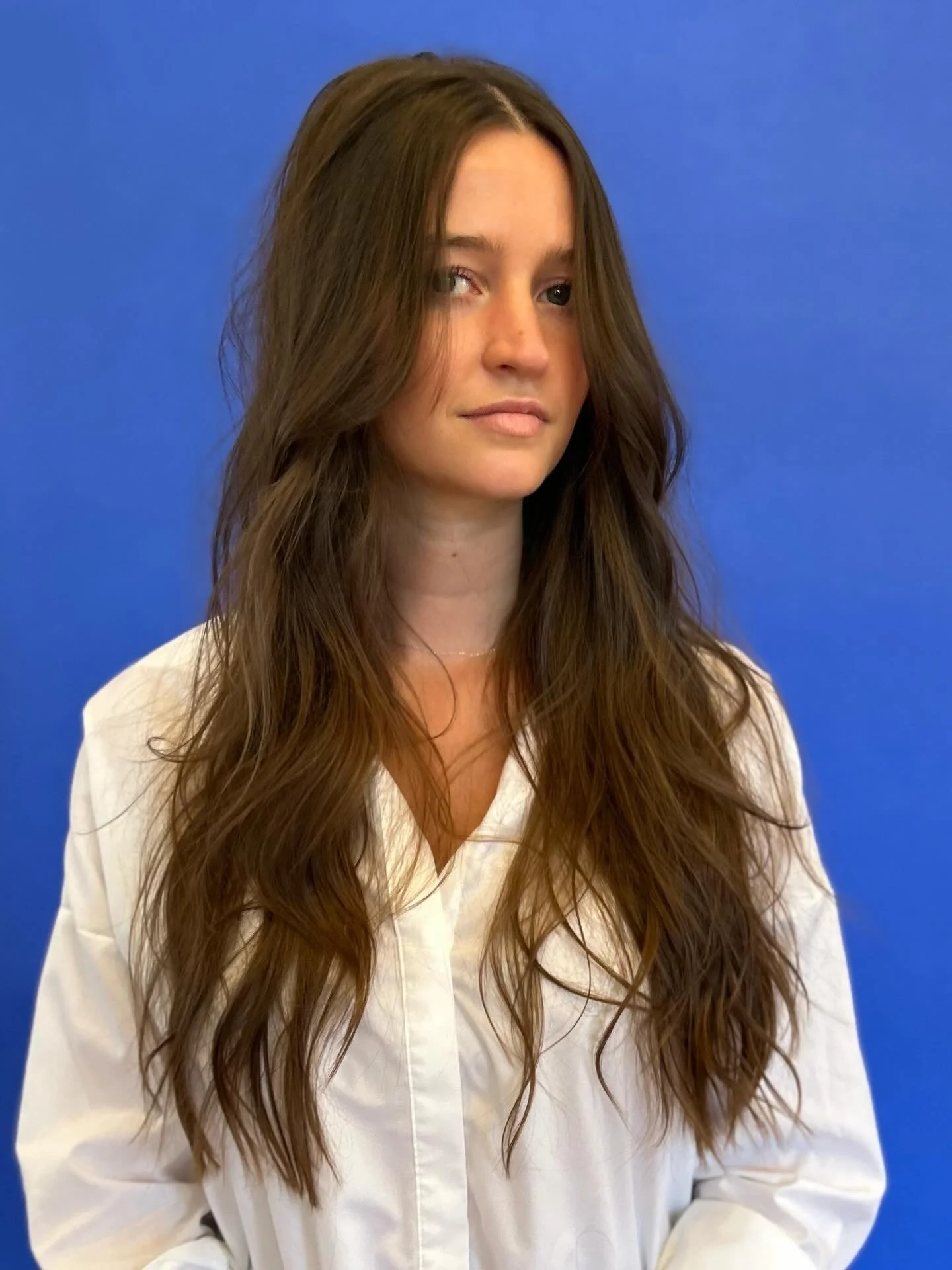 Long brunette layers haircut by Michael Goude in East Austin