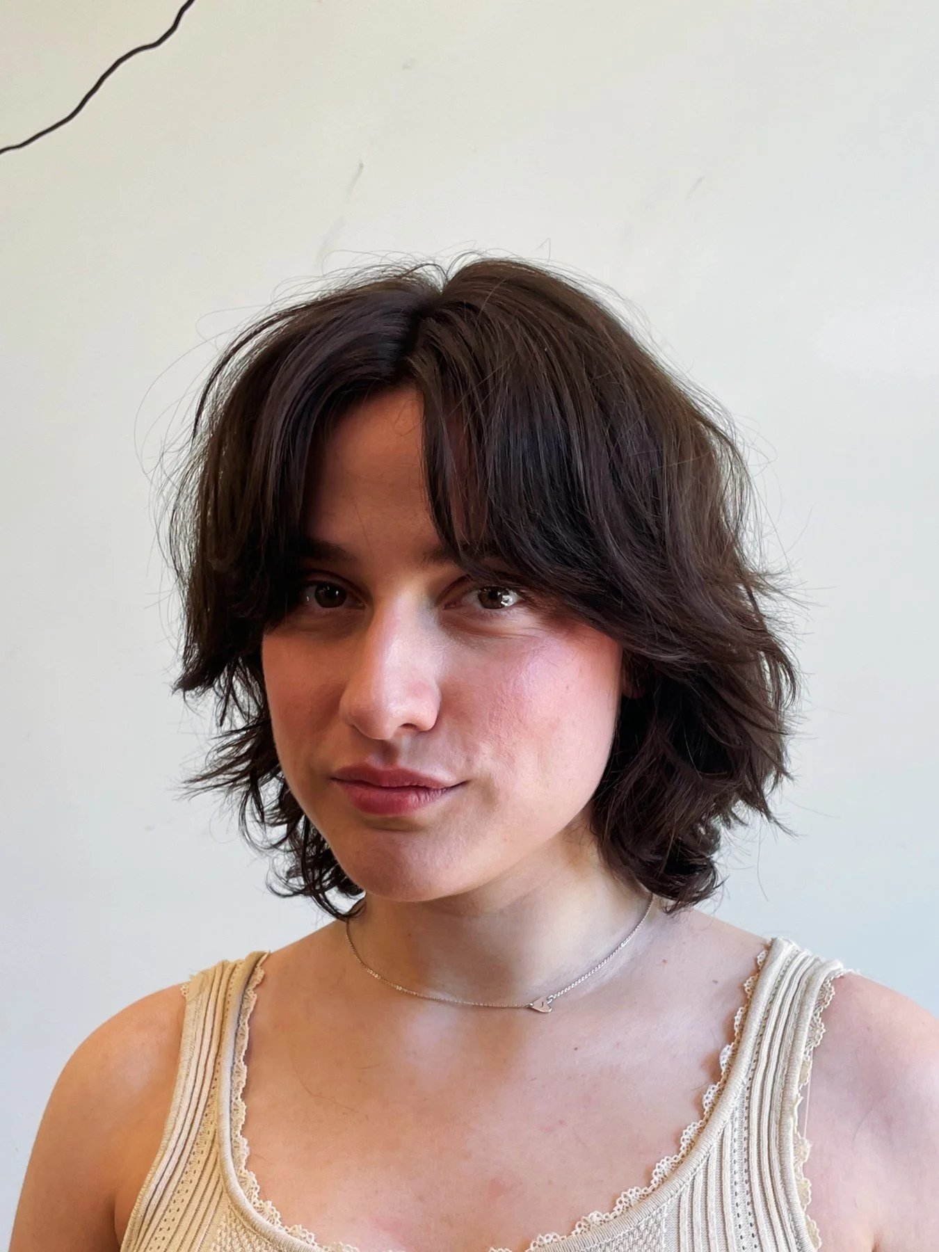 Shag haircut with curtain bangs by Michael Goude in East Austin