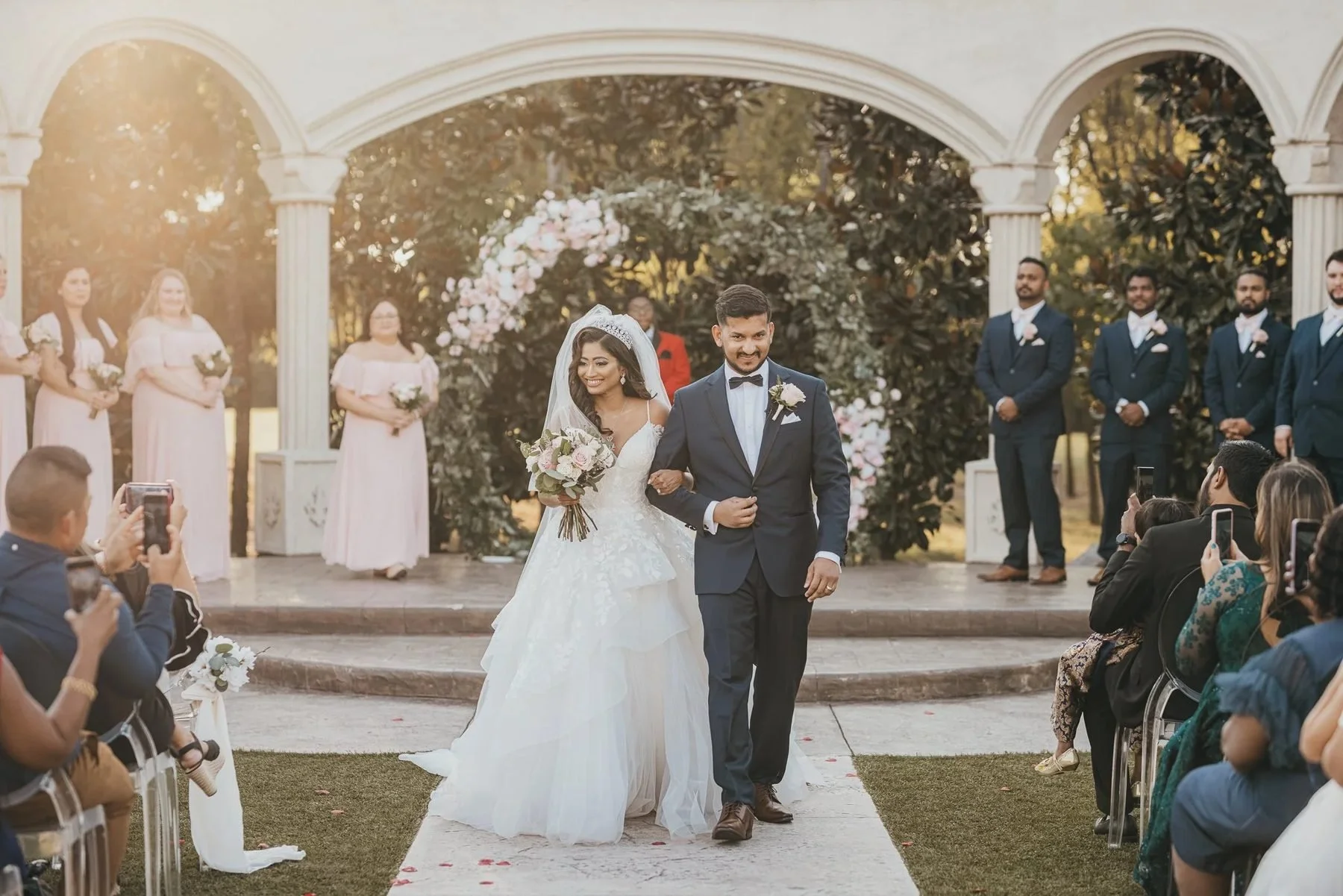 Circle arch floral decor for wedding ceremony at The Knotting Hill Place