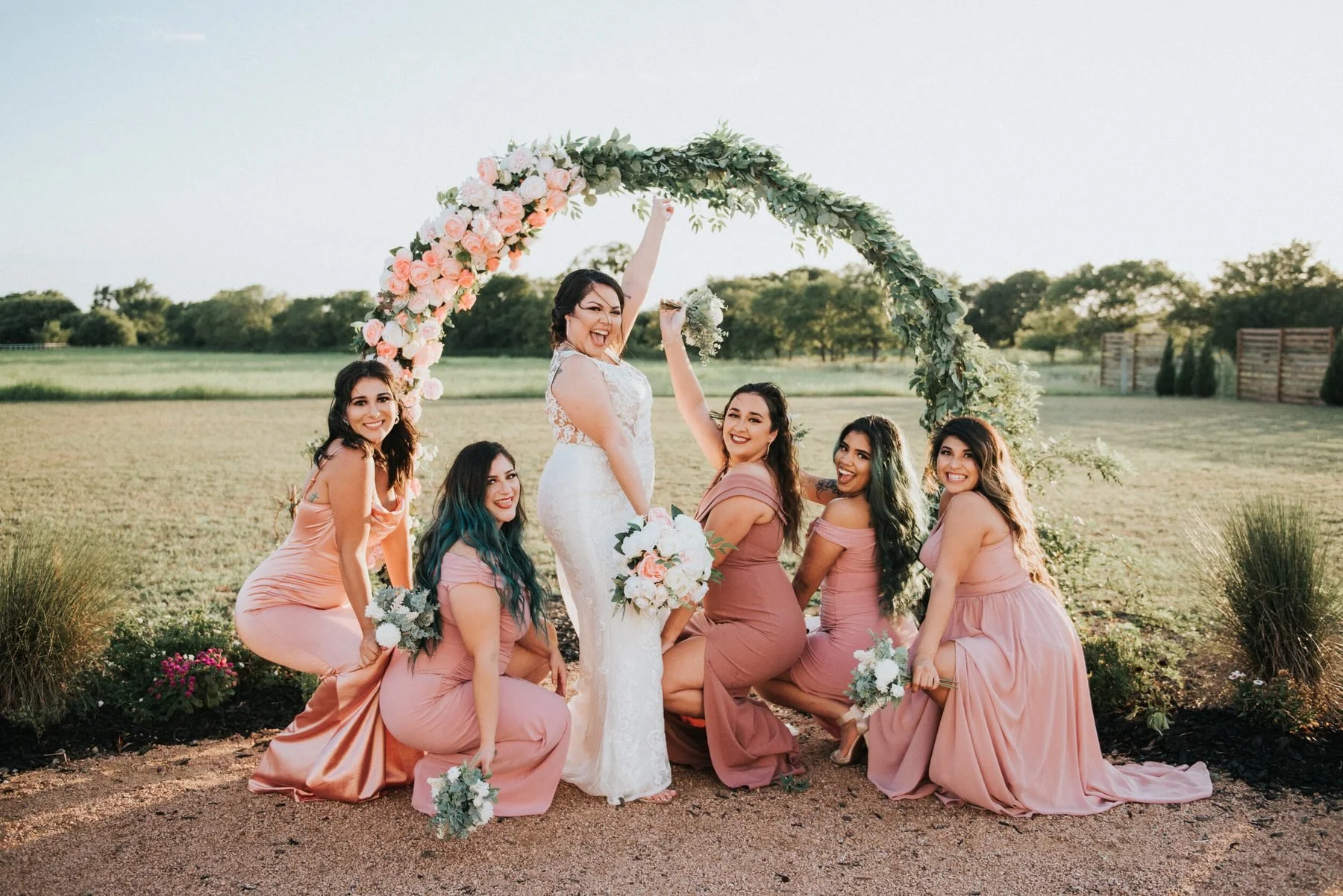 Circular florals arch decor. Venue: Stem and Lights
