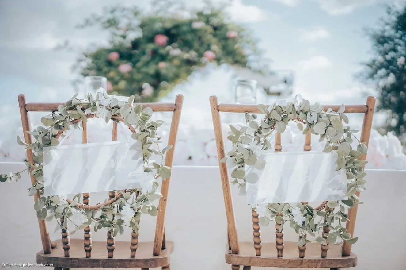 Chair decor wreath. Venue: Hidden Gardens