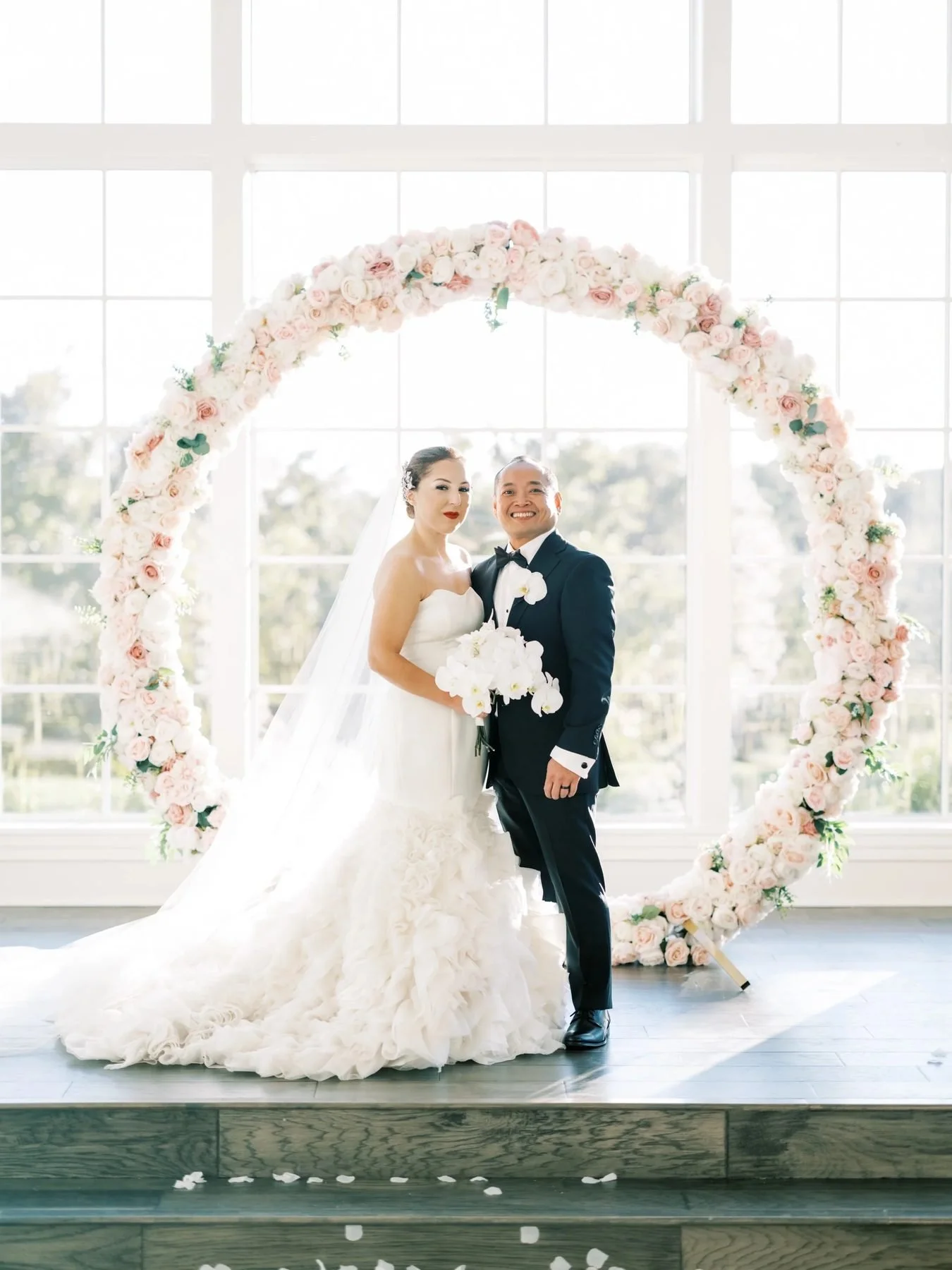 Full floral circle arch for ceremony. Venue: The Hill Side Estate