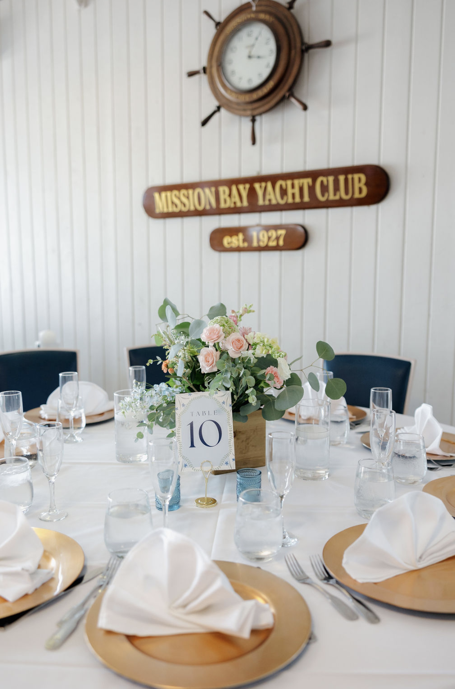 Table setting and florals at Mission Bay Yacht Club.