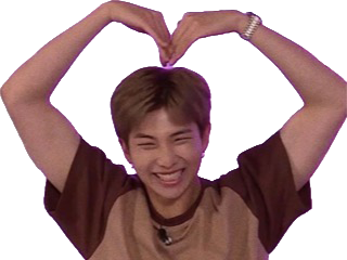 Smiling person forming a heart shape with their hands