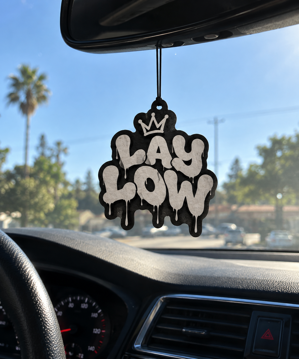 Graffiti Air Freshener in Sunlit Car.png