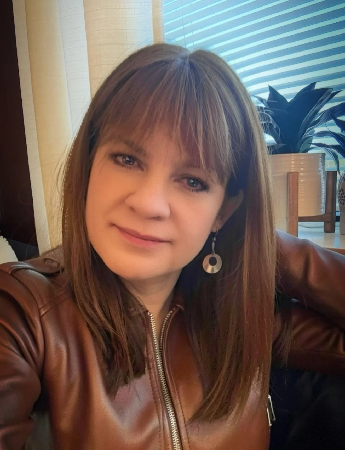 Picture of Kathi Hall, LMFT, CCTP-II, ADHD-CCSP, owner and operator of Hope for the Journey Counseling smiling for the camera