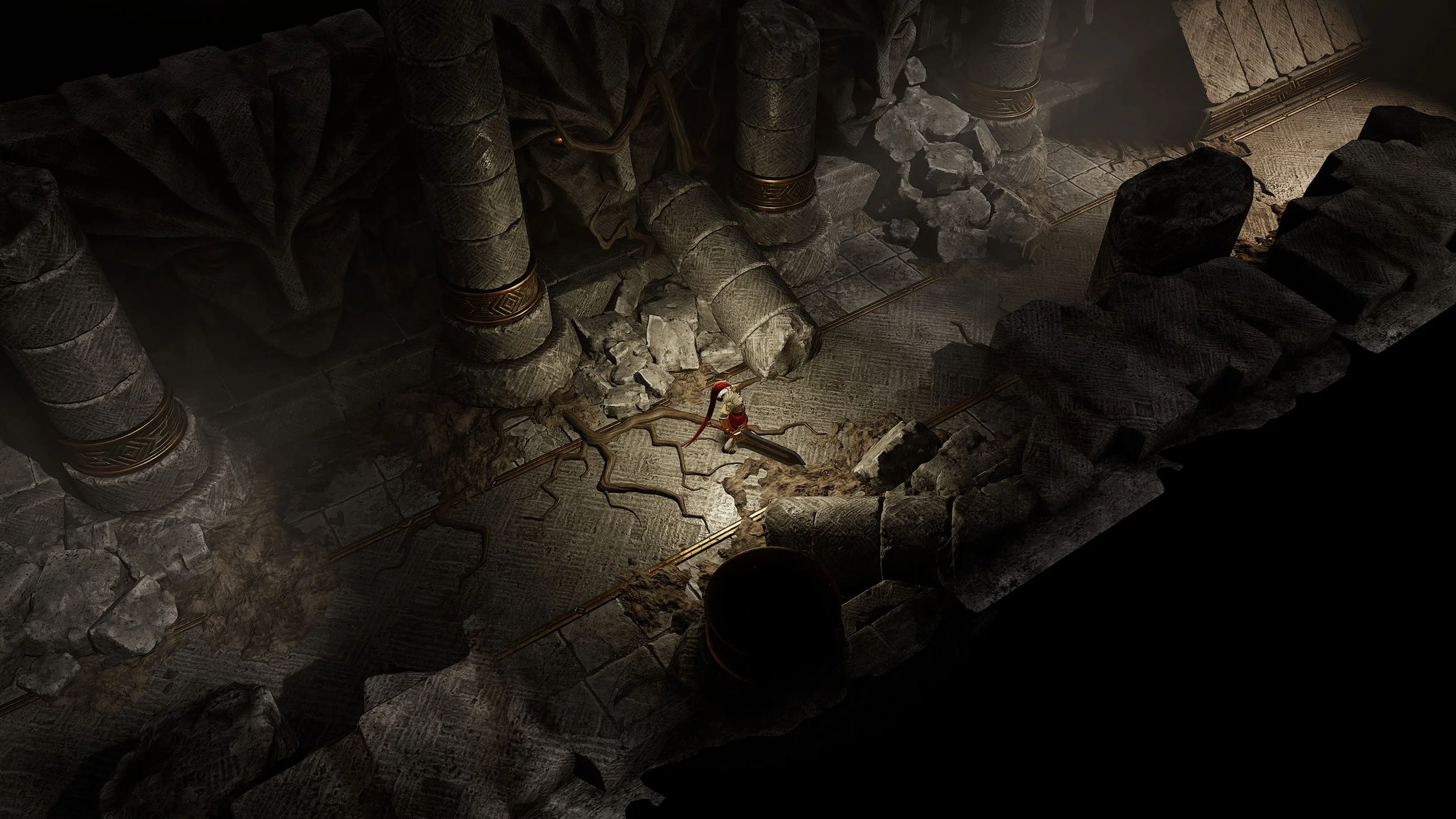 Small warrior in red standing among ancient stone columns and rubble in a dark temple ruin