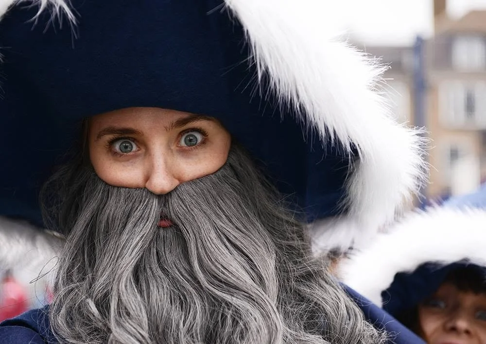 Close-up of an actor dressed as wizard for walkabout clown show.