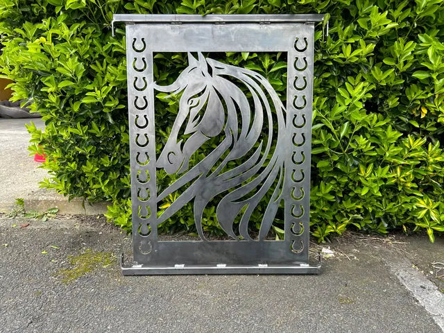 Bespoke steel horse balustrade panel CNC plasma cut and welded in-house by PlazCutz in Morecambe, Lancashire, featuring a decorative horse silhouette, horseshoe details and fabricated steel frame.