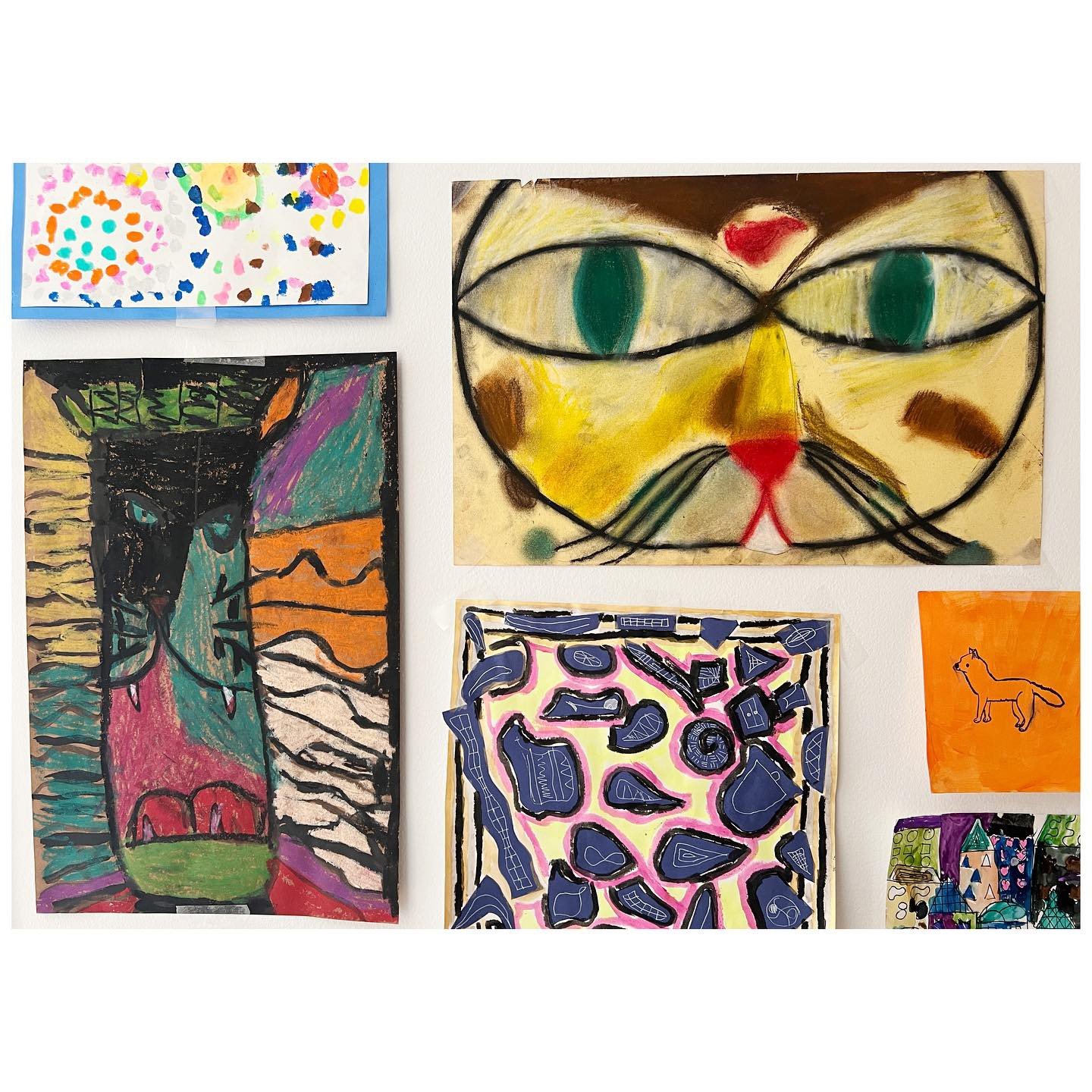 Group of expressive colorful drawings arranged as an art collection