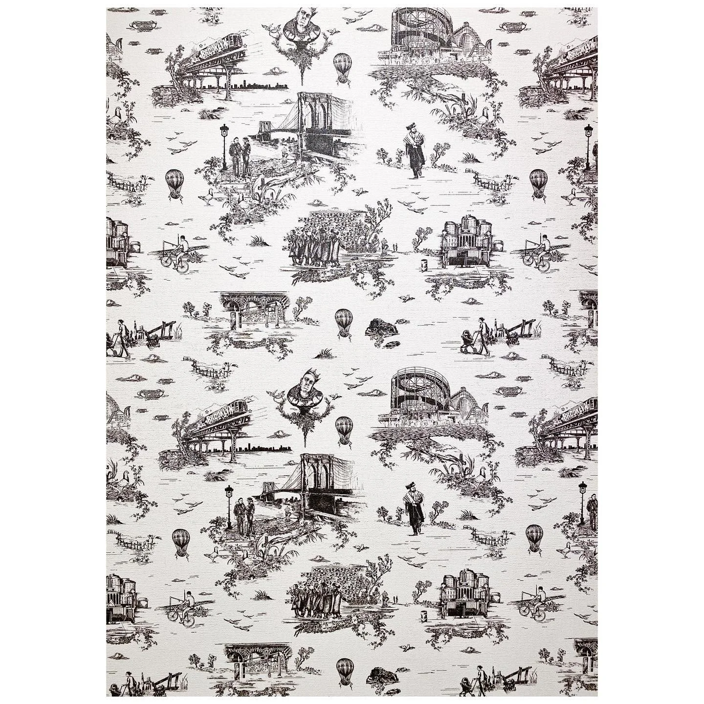 Black-and-white toile wallpaper pattern with illustrated scenes and buildings