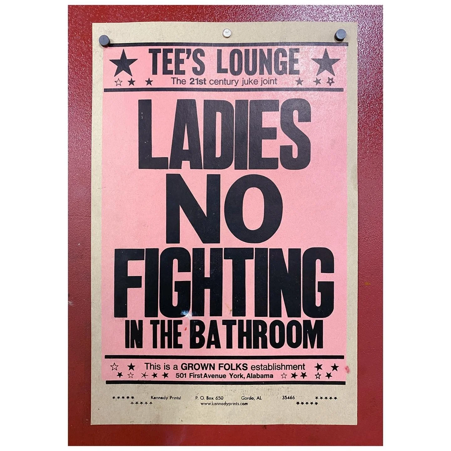 Pink-and-black letterpress poster with bold condensed typography